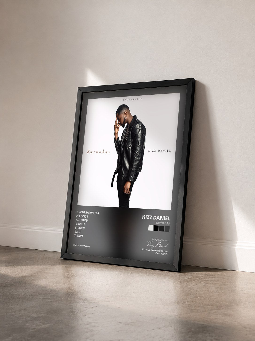 #noir Tableau de l'album Barnabas de Kizz Daniel vu de trois quarts, cadre noir