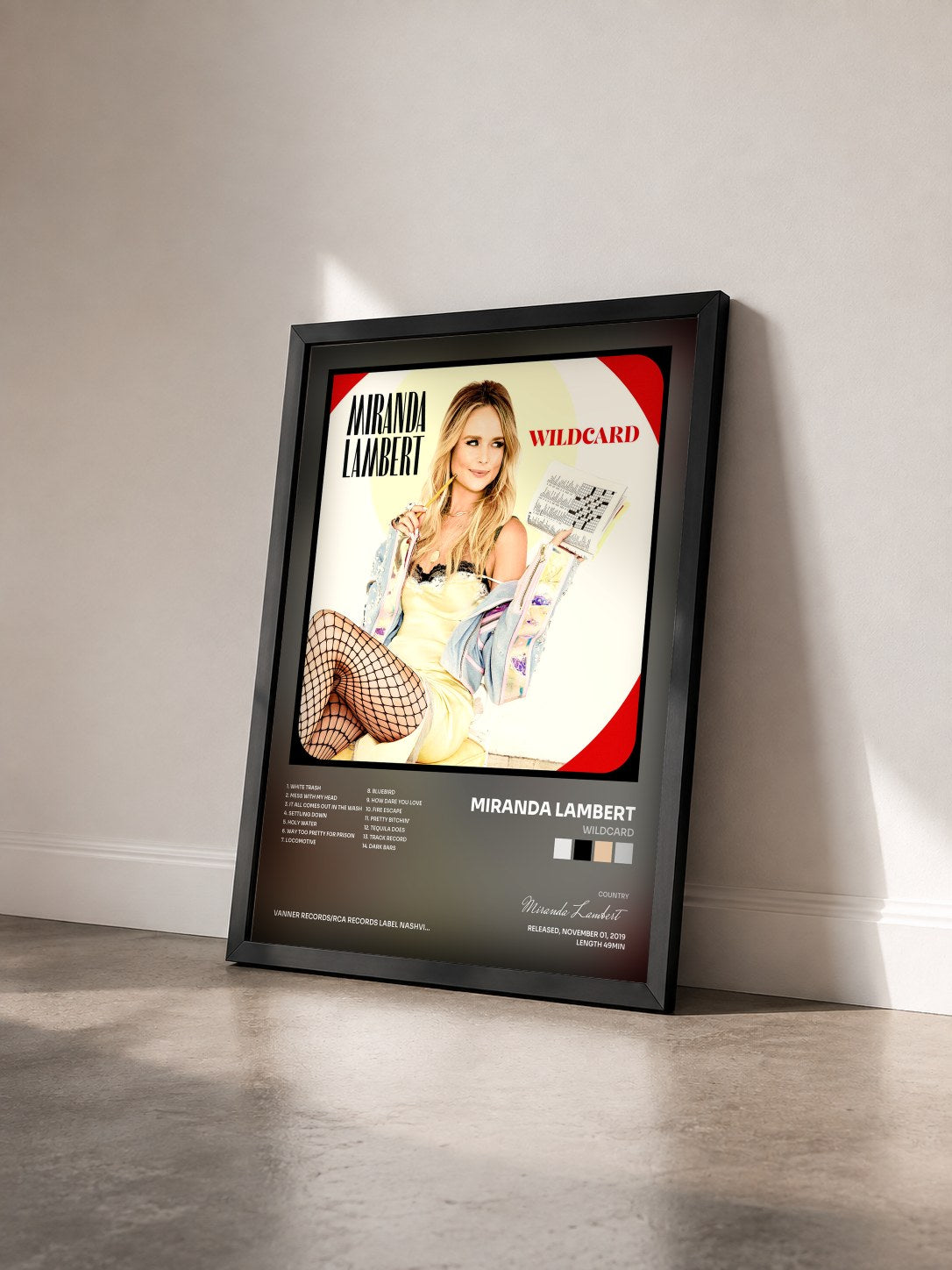#noir Tableau de l'album Wildcard de Miranda Lambert vu de trois quarts, cadre noir