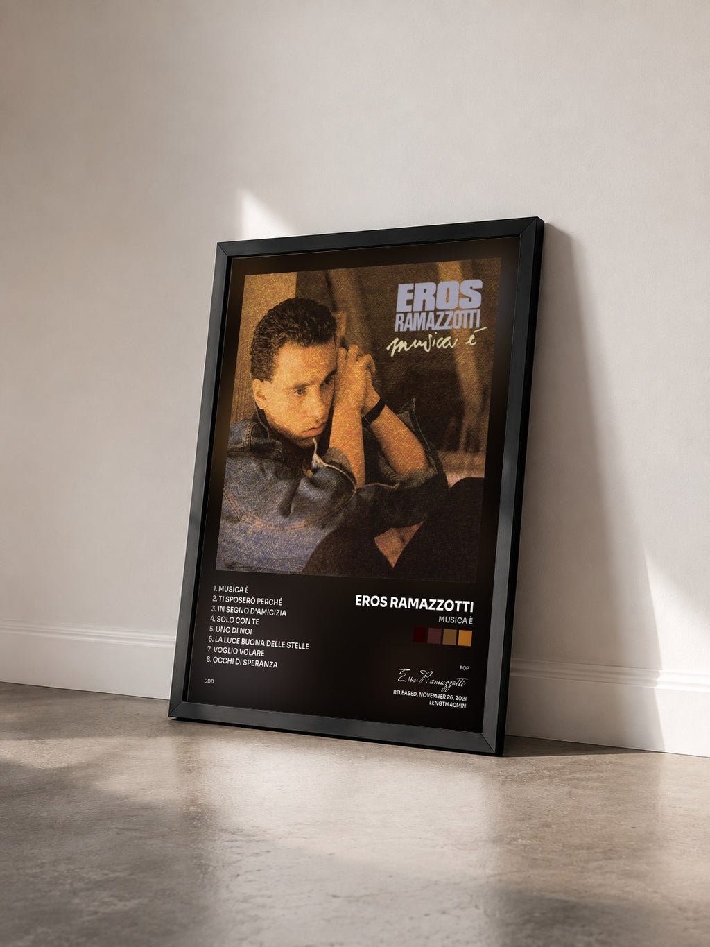#noir Tableau de l'album Musica è de Eros Ramazzotti vu de trois quarts, cadre noir
