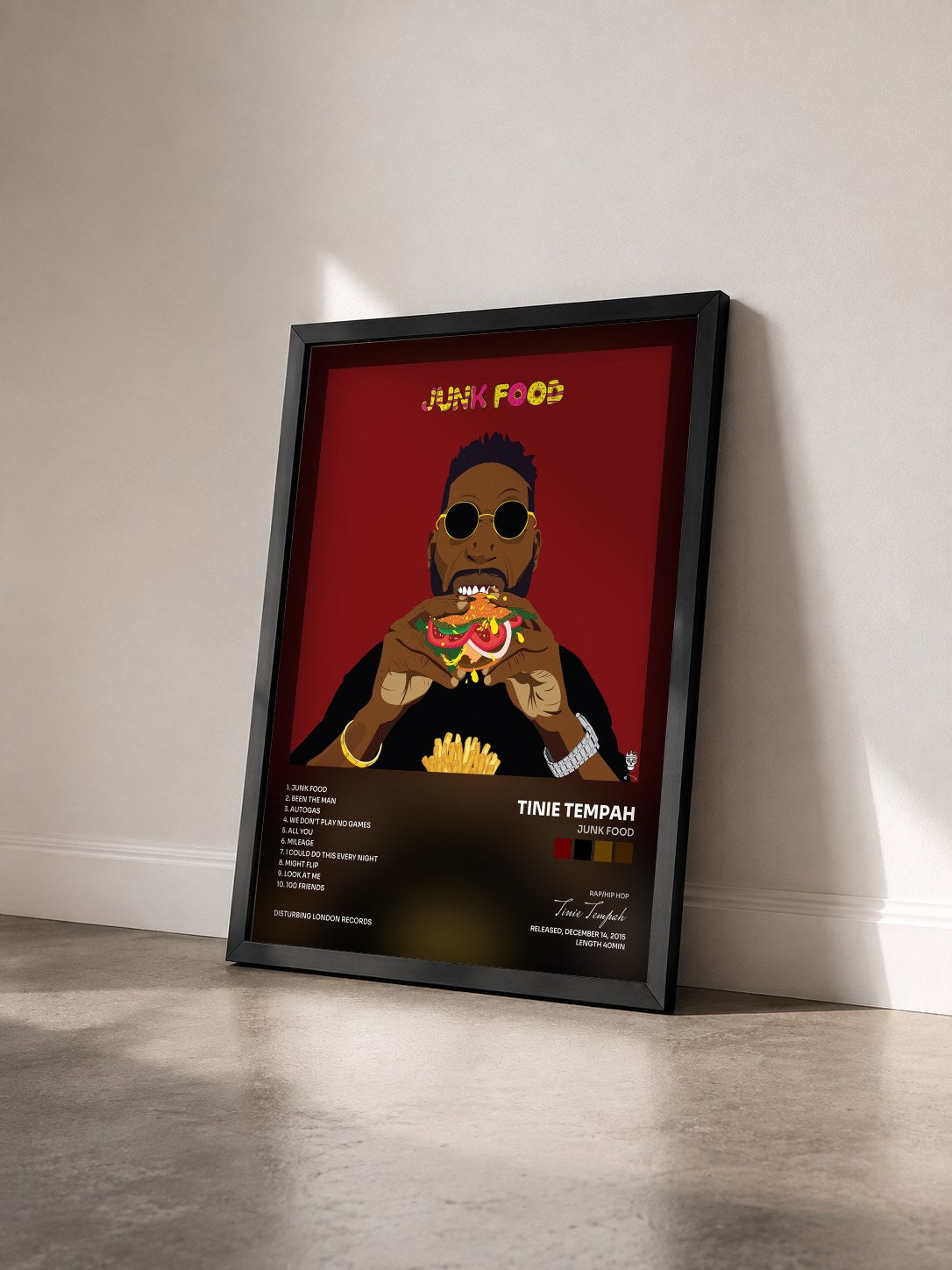 #noir Tableau de l'album Junk Food de Tinie Tempah vu de trois quarts, cadre noir