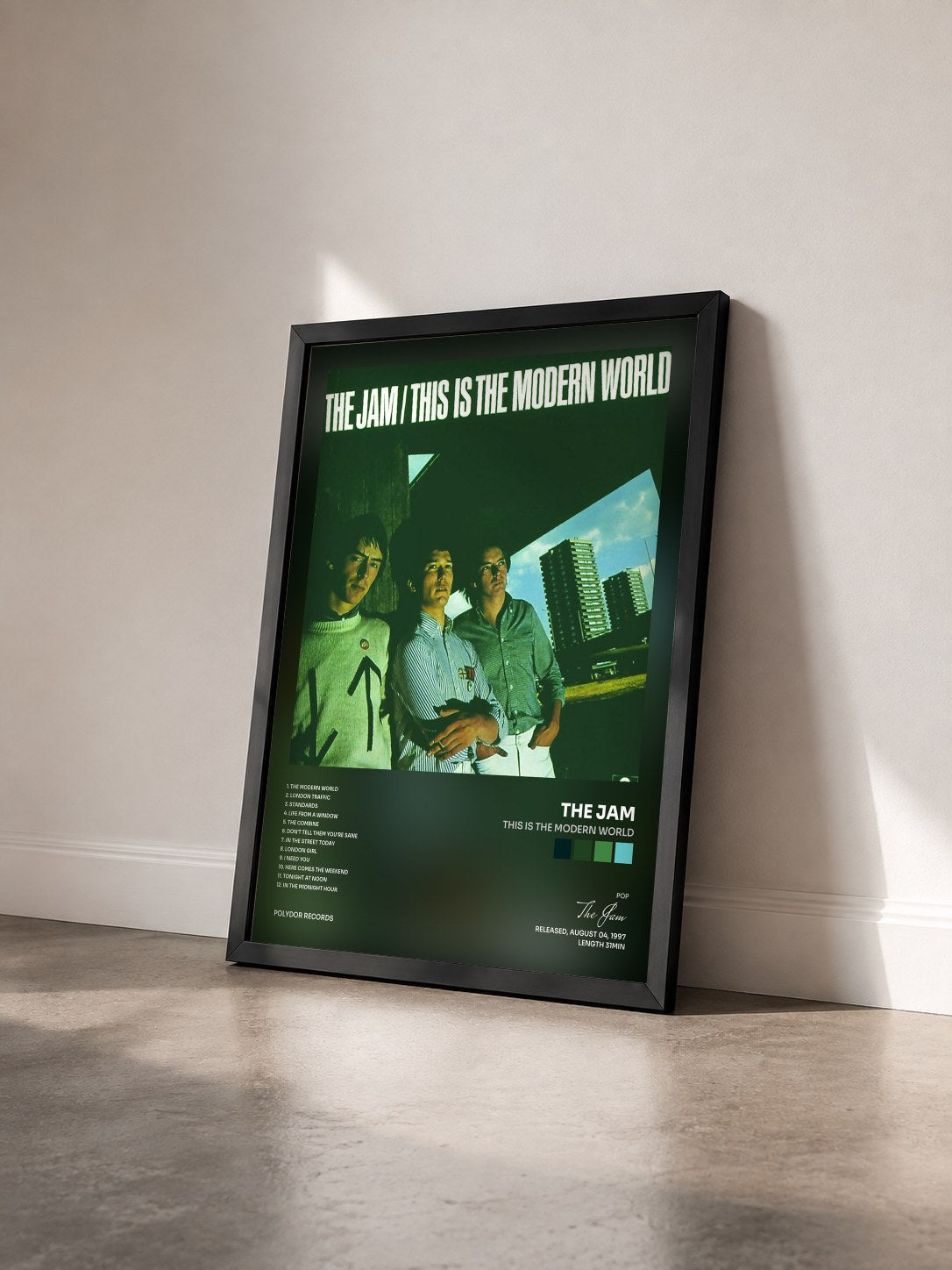 #noir Tableau de l'album This Is The Modern World de The Jam vu de trois quarts, cadre noir