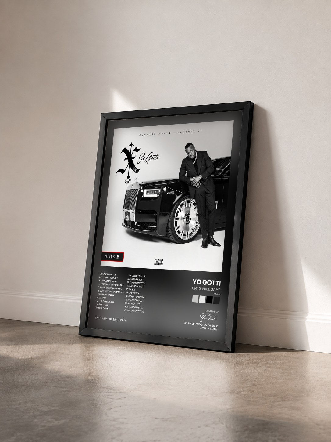 #noir Tableau de l'album CM10: Free Game (Side B) de Yo Gotti vu de trois quarts, cadre noir