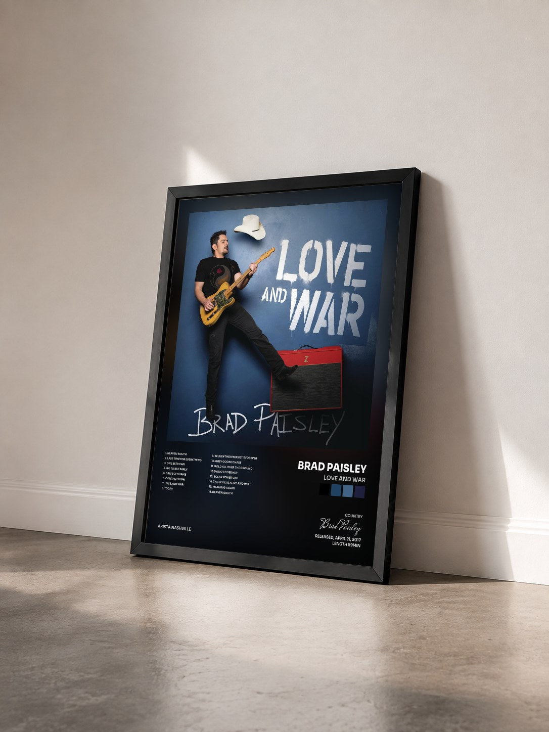 #noir Tableau de l'album Love and War de Brad Paisley vu de trois quarts, cadre noir