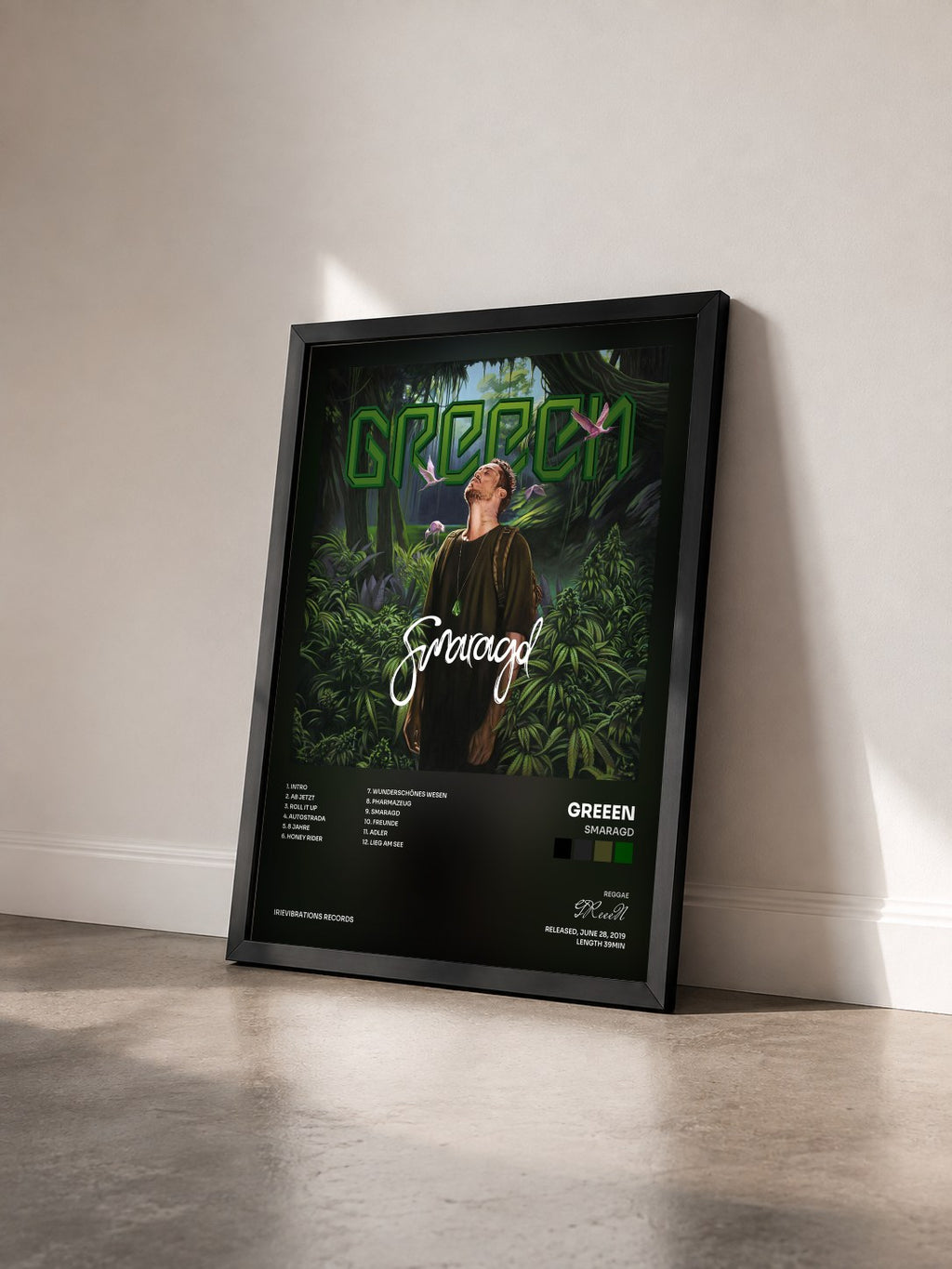 #noir Tableau de l'album Smaragd de GReeeN vu de trois quarts, cadre noir