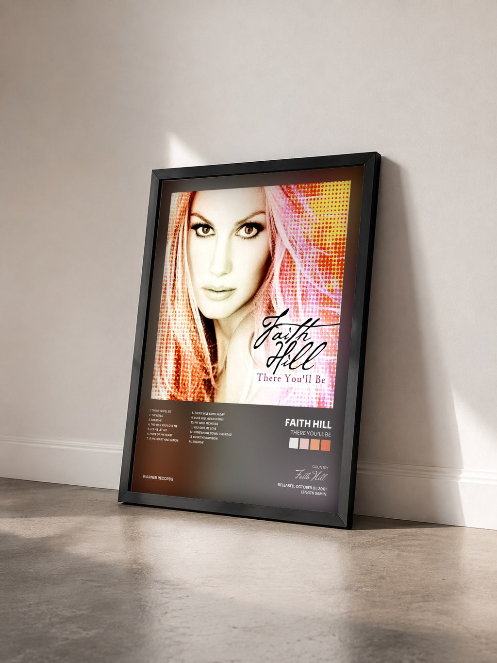 #noir Tableau de l'album There You'll Be de Faith Hill vu de trois quarts, cadre noir