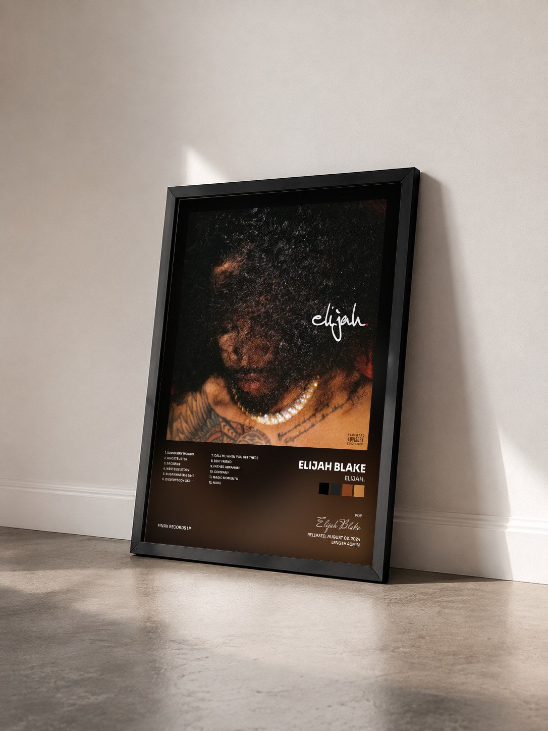 #noir Tableau de l'album elijah. de Elijah Blake vu de trois quarts, cadre noir