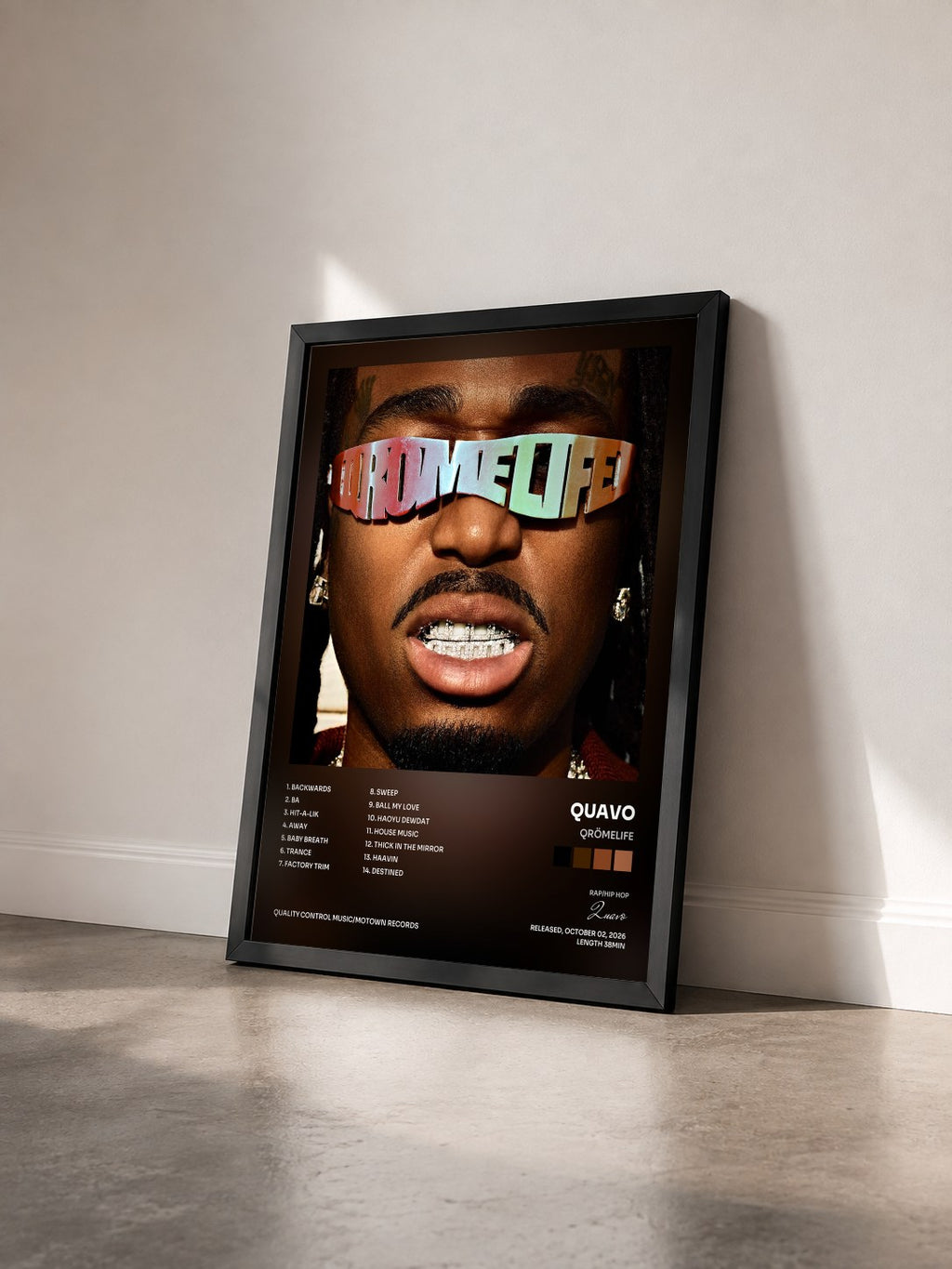 #noir Tableau de l'album QRÖMELIFE de Quavo vu de trois quarts, cadre noir