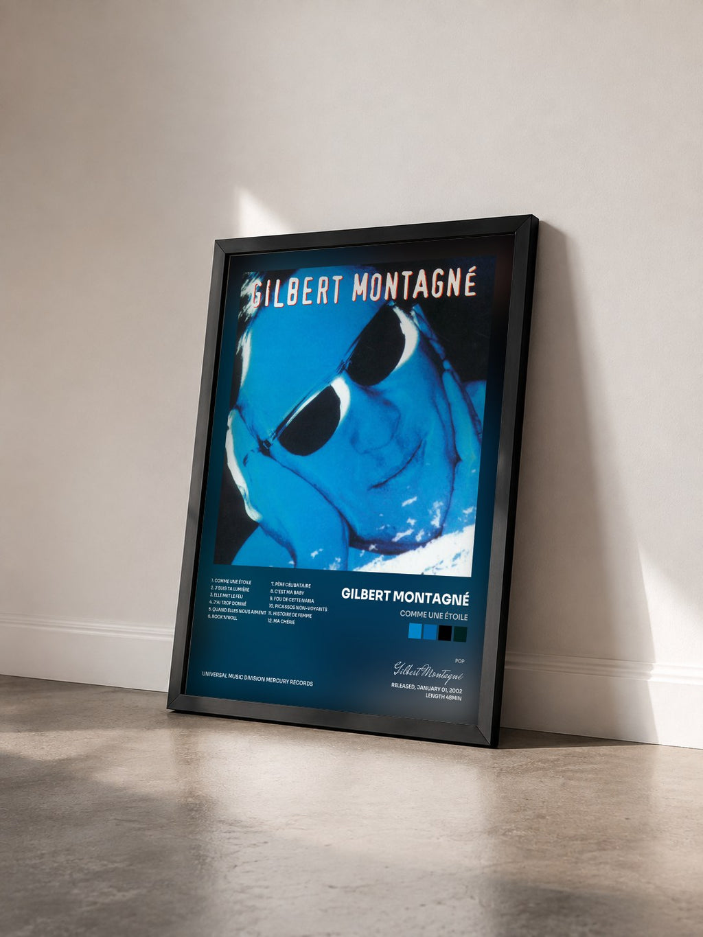 #noir Tableau de l'album Comme une étoile de Gilbert Montagné vu de trois quarts, cadre noir