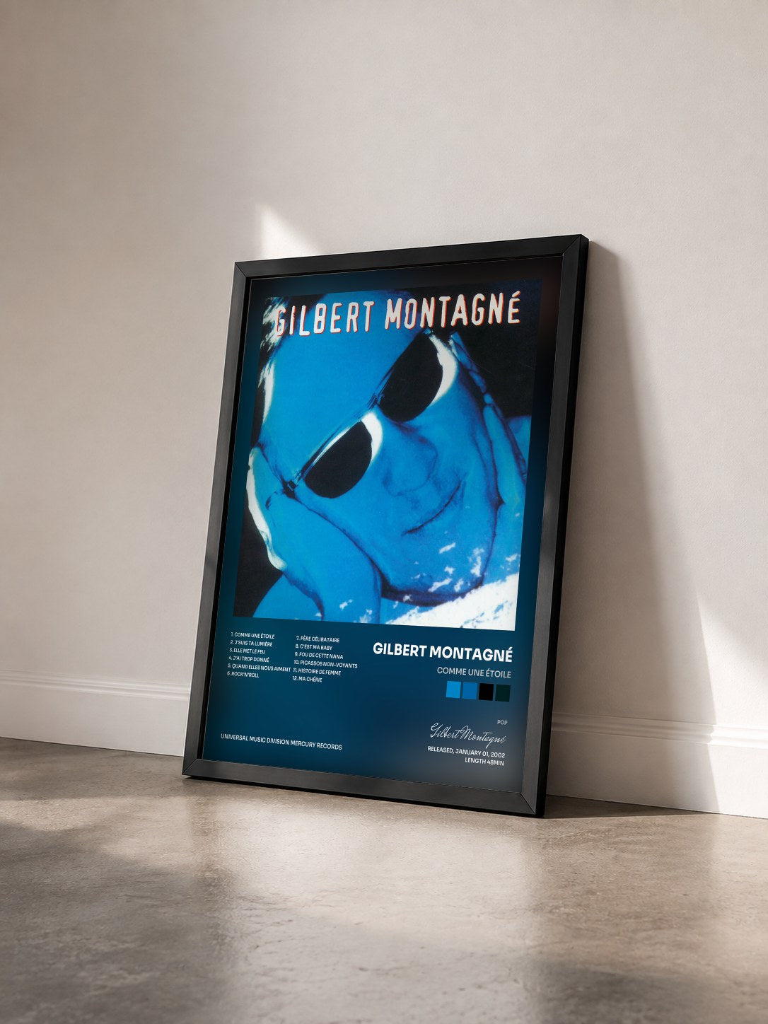 #noir Tableau de l'album Comme une étoile de Gilbert Montagné vu de trois quarts, cadre noir