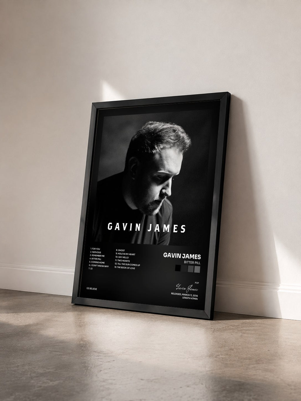 #noir Tableau de l'album Bitter Pill de Gavin James vu de trois quarts, cadre noir