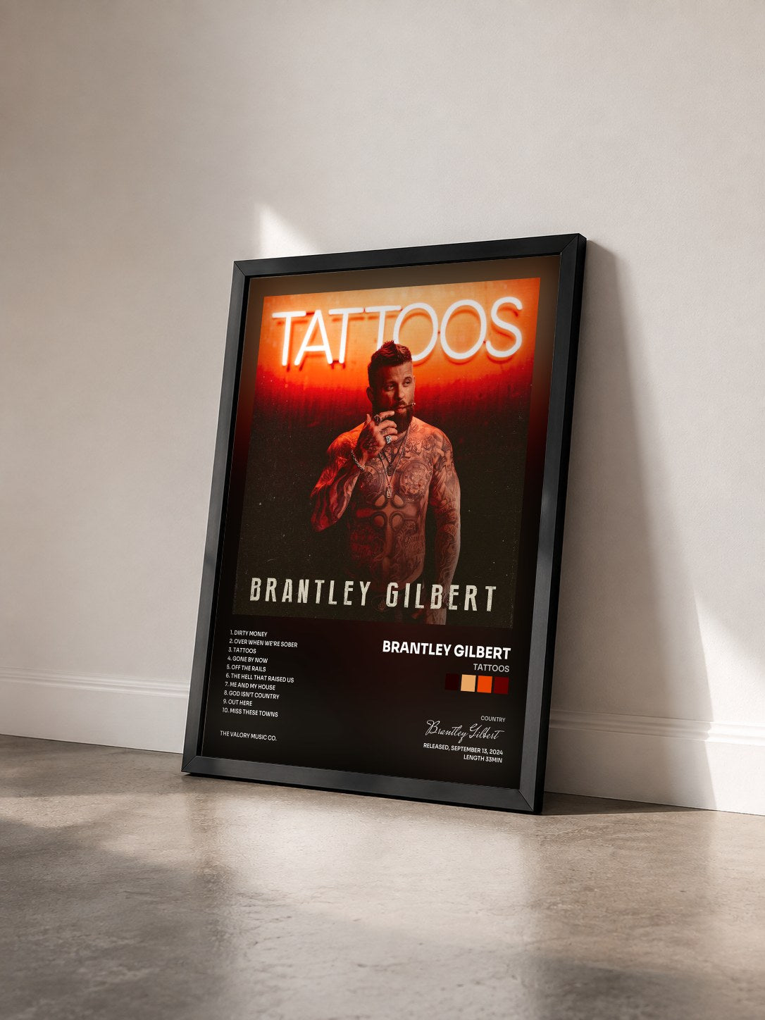 #noir Tableau de l'album Tattoos de Brantley Gilbert vu de trois quarts, cadre noir