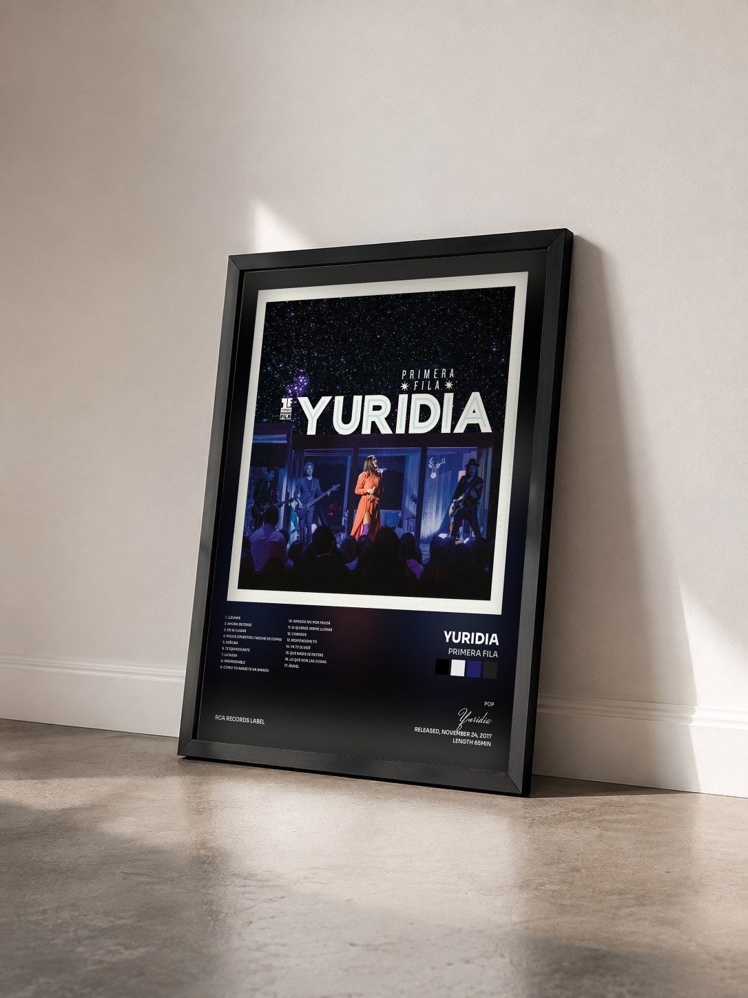 #noir Tableau de l'album Primera Fila de Yuridia vu de trois quarts, cadre noir