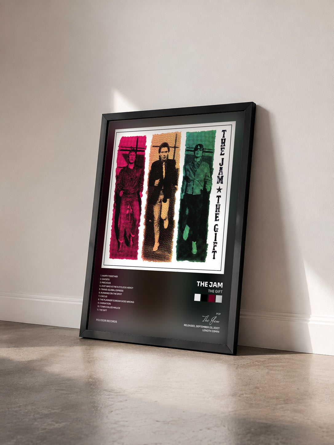 #noir Tableau de l'album The Gift de The Jam vu de trois quarts, cadre noir