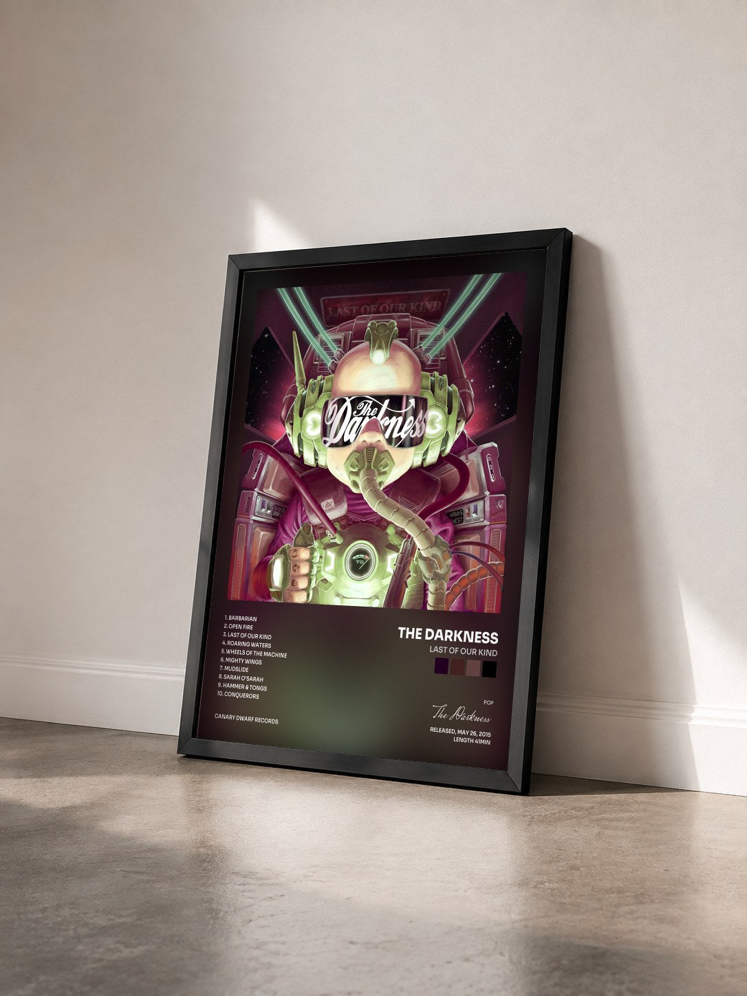 #noir Tableau de l'album Last of Our Kind de The Darkness vu de trois quarts, cadre noir