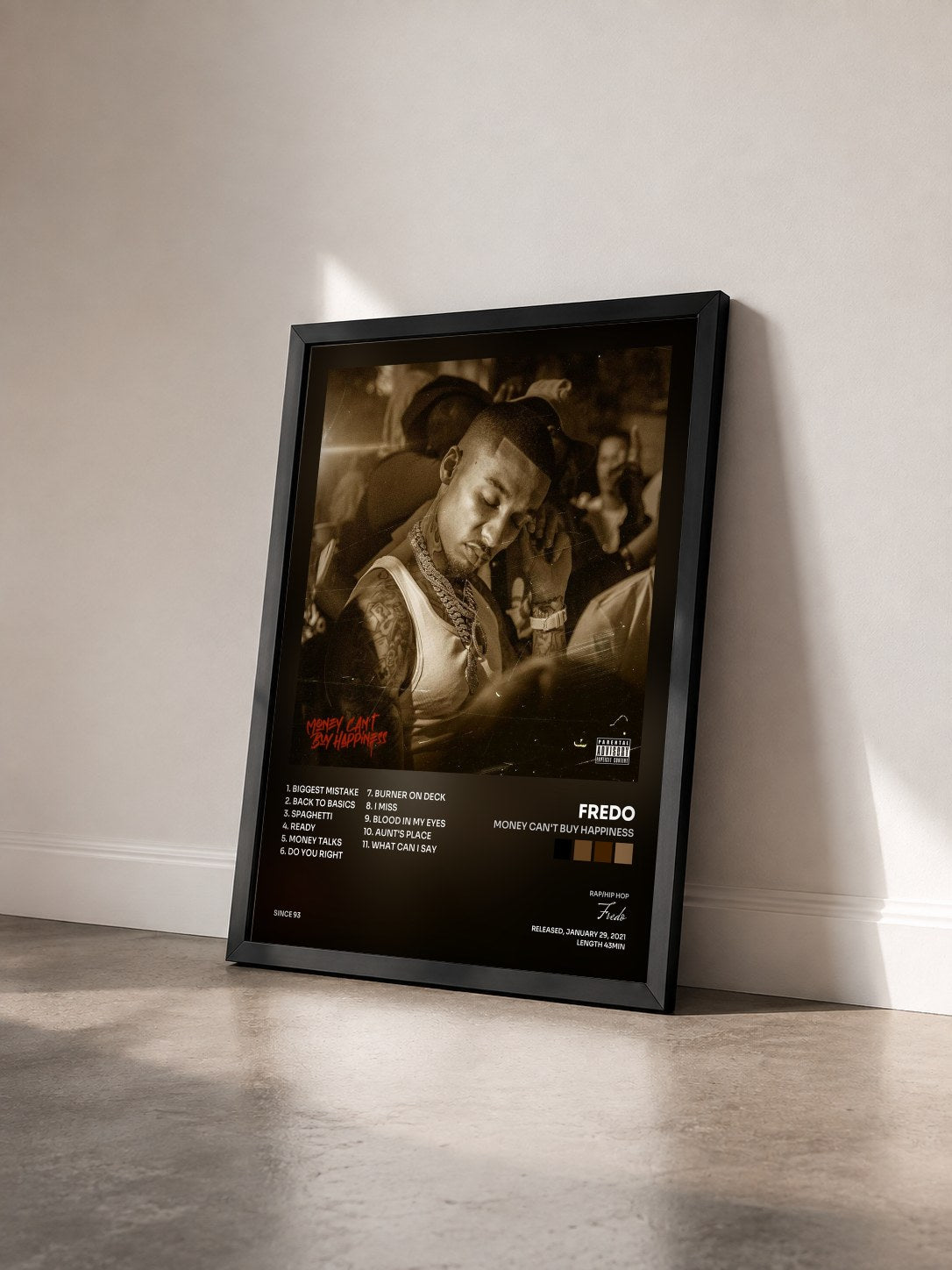 #noir Tableau de l'album Money Can't Buy Happiness de Fredo vu de trois quarts, cadre noir