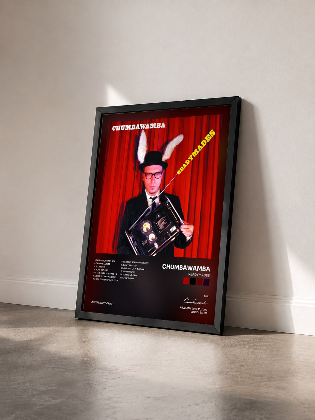 #noir Tableau de l'album Readymades de Chumbawamba vu de trois quarts, cadre noir