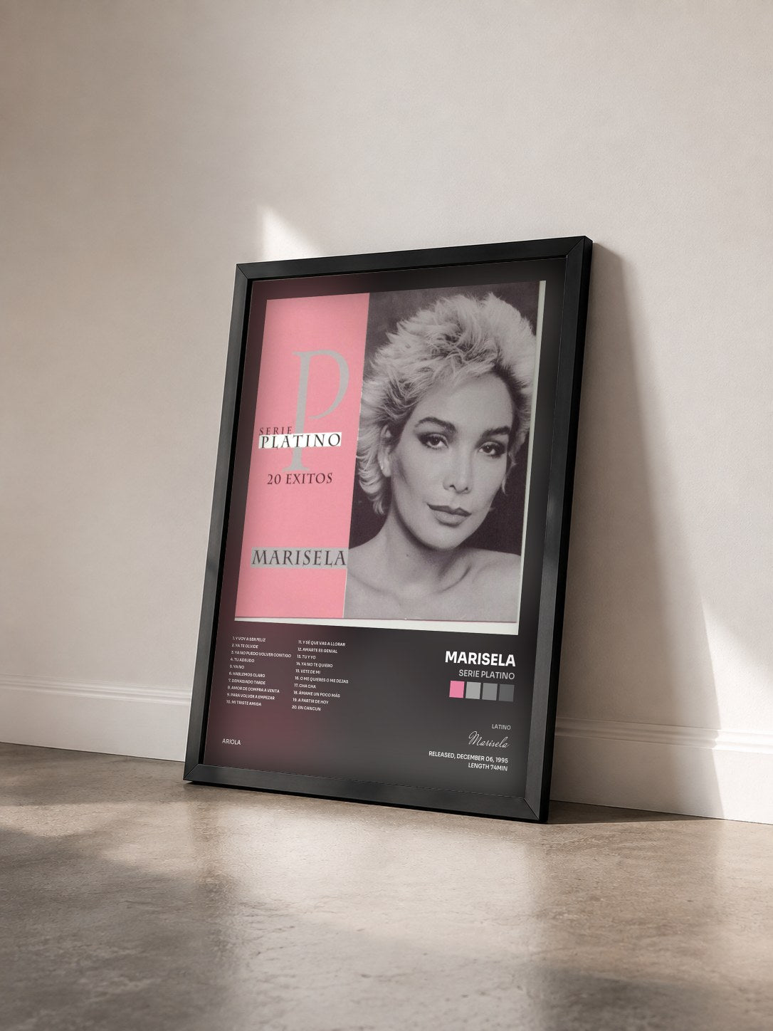 #noir Tableau de l'album Serie Platino de Marisela vu de trois quarts, cadre noir