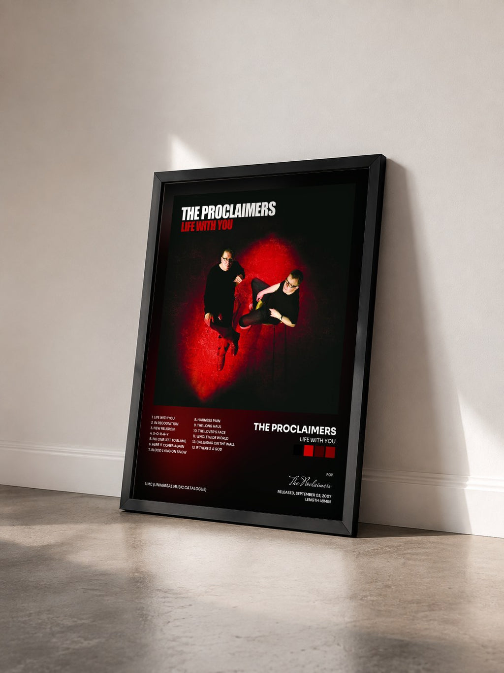 #noir Tableau de l'album Life With You de The Proclaimers vu de trois quarts, cadre noir