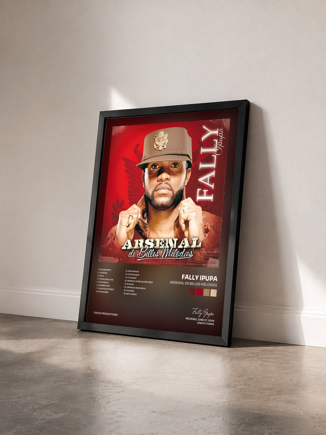 #noir Tableau de l'album Arsenal de belles mélodies de Fally Ipupa vu de trois quarts, cadre noir