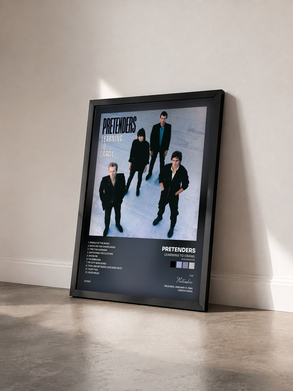 #noir Tableau de l'album Learning to Crawl (2018 Remaster) de Pretenders vu de trois quarts, cadre noir