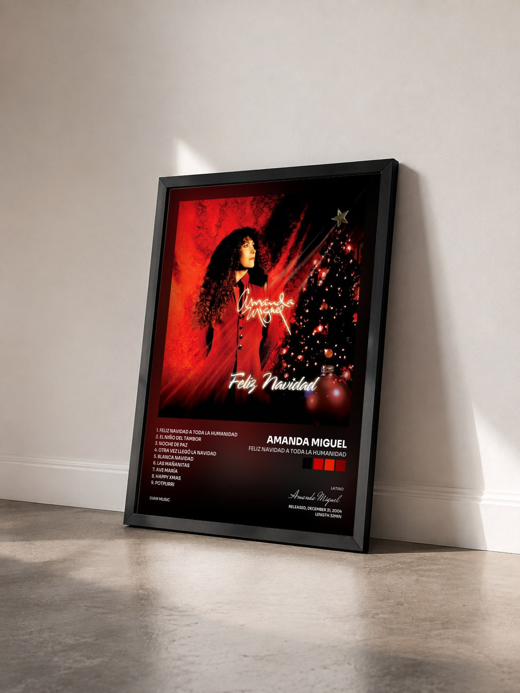 #noir Tableau de l'album Feliz Navidad A Toda La Humanidad de Amanda Miguel vu de trois quarts, cadre noir