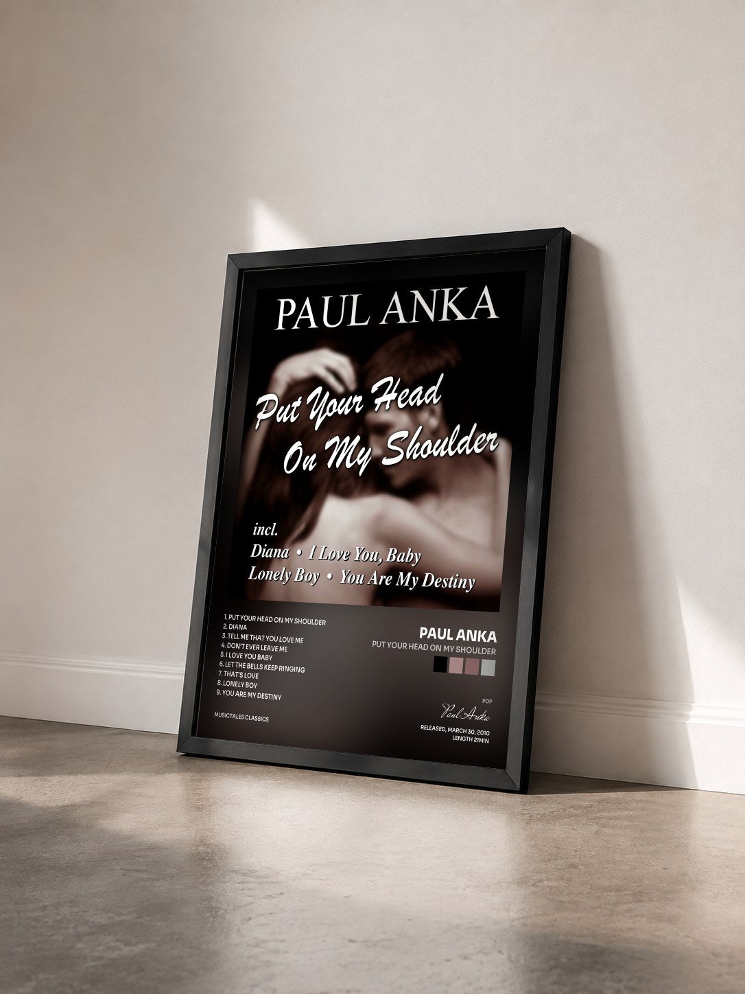 #noir Tableau de l'album Put Your Head On My Shoulder de Paul Anka vu de trois quarts, cadre noir
