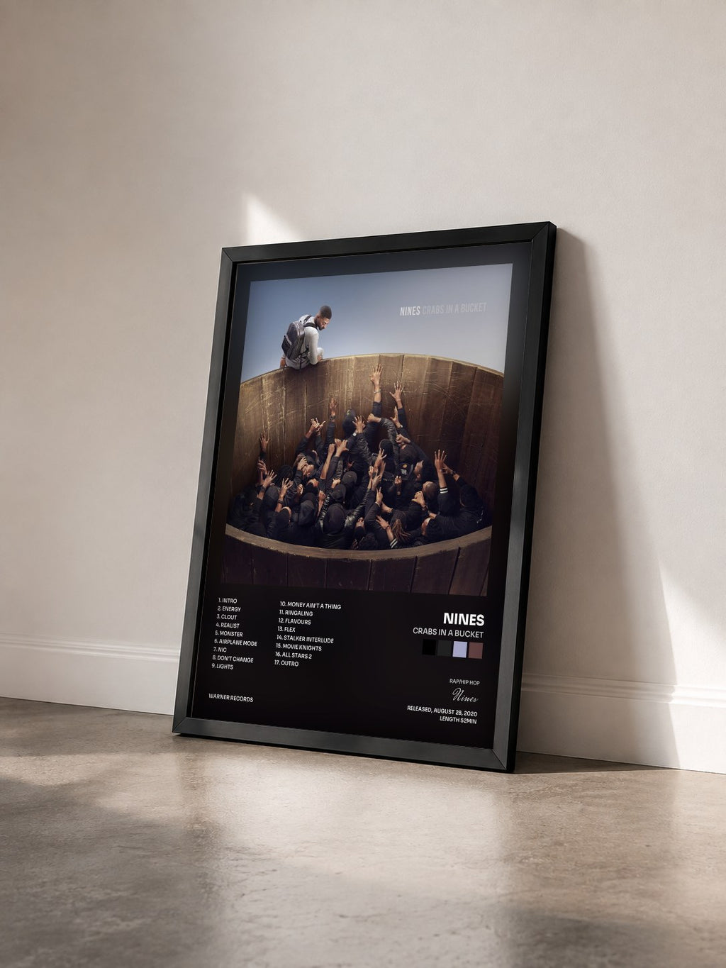 #noir Tableau de l'album Crabs In A Bucket de Nines vu de trois quarts, cadre noir