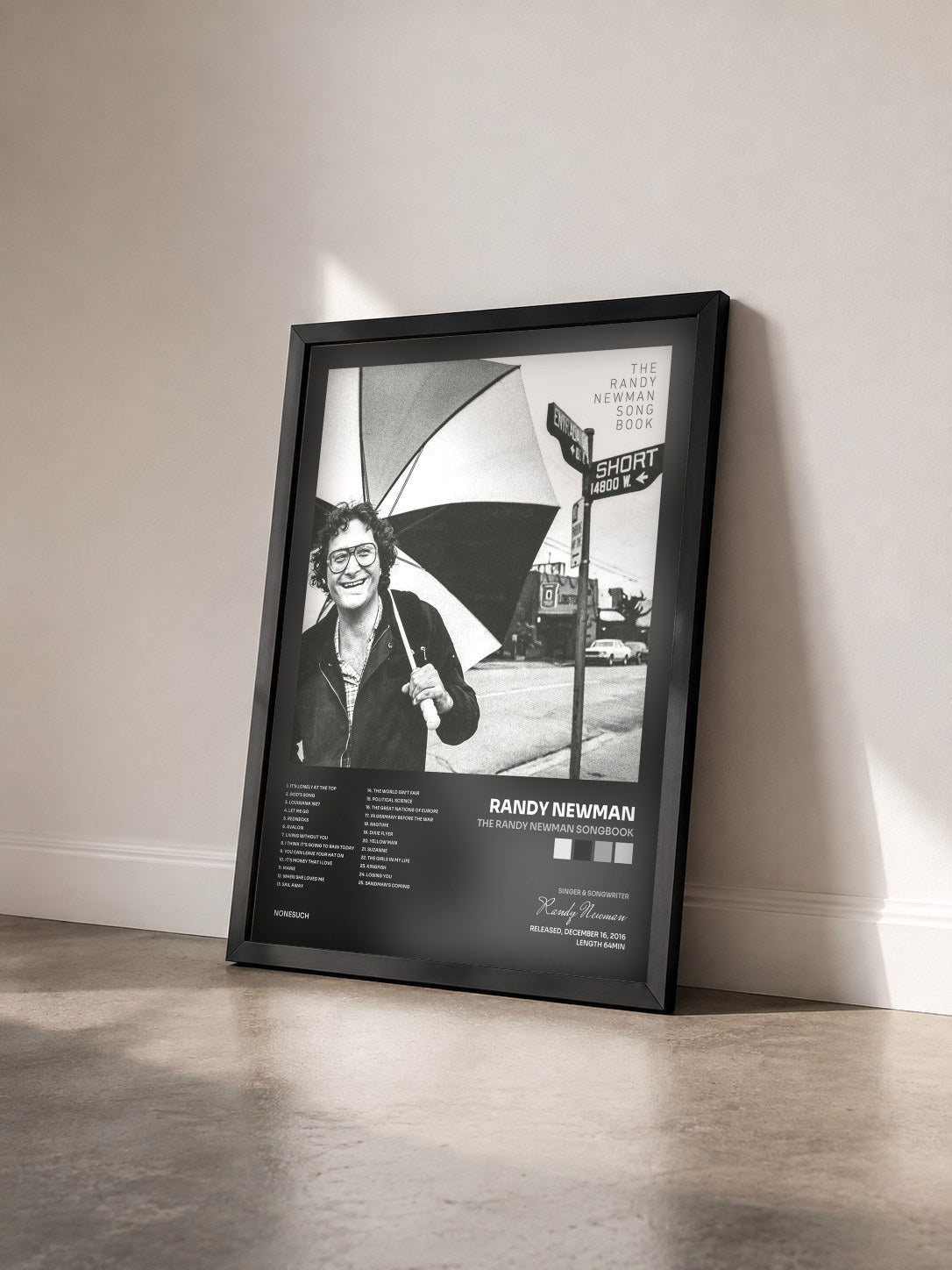 #noir Tableau de l'album The Randy Newman Songbook de Randy Newman vu de trois quarts, cadre noir