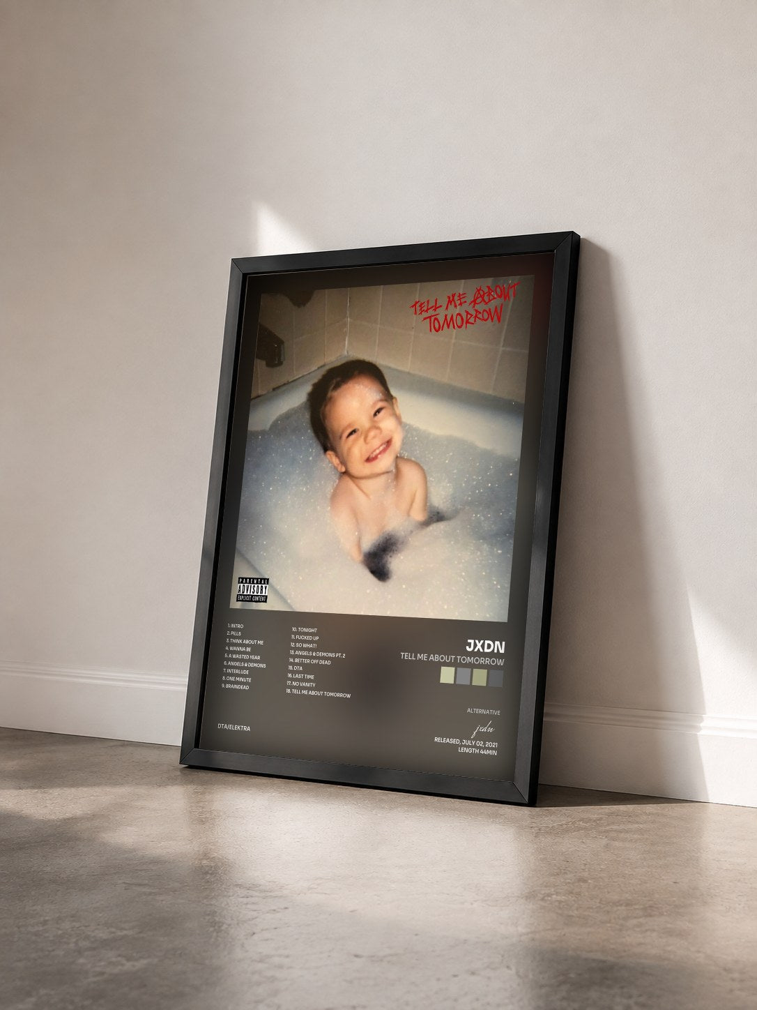 #noir Tableau de l'album Tell Me About Tomorrow de jxdn vu de trois quarts, cadre noir