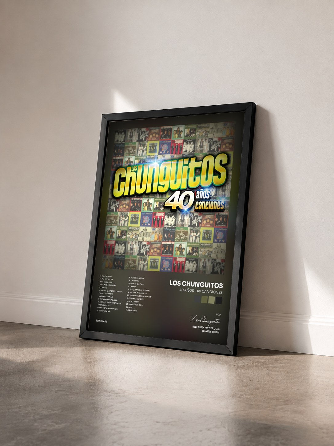 #noir Tableau de l'album 40 Años - 40 Canciones de Los Chunguitos vu de trois quarts, cadre noir