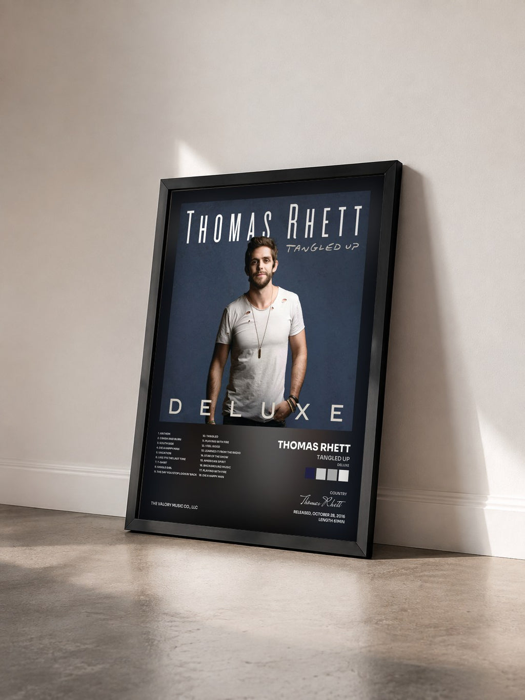 #noir Tableau de l'album Tangled Up (Deluxe) de Thomas Rhett vu de trois quarts, cadre noir