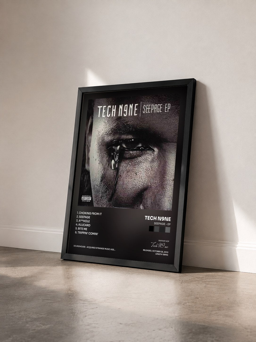 #noir Tableau de l'album Seepage - EP de Tech N9ne vu de trois quarts, cadre noir