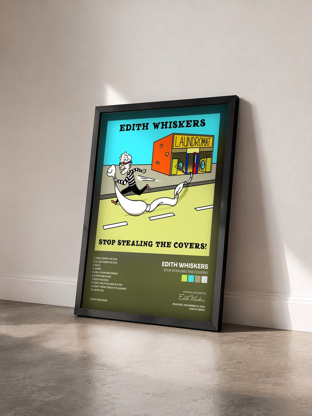 #noir Tableau de l'album Stop Stealing The Covers! de Edith Whiskers vu de trois quarts, cadre noir