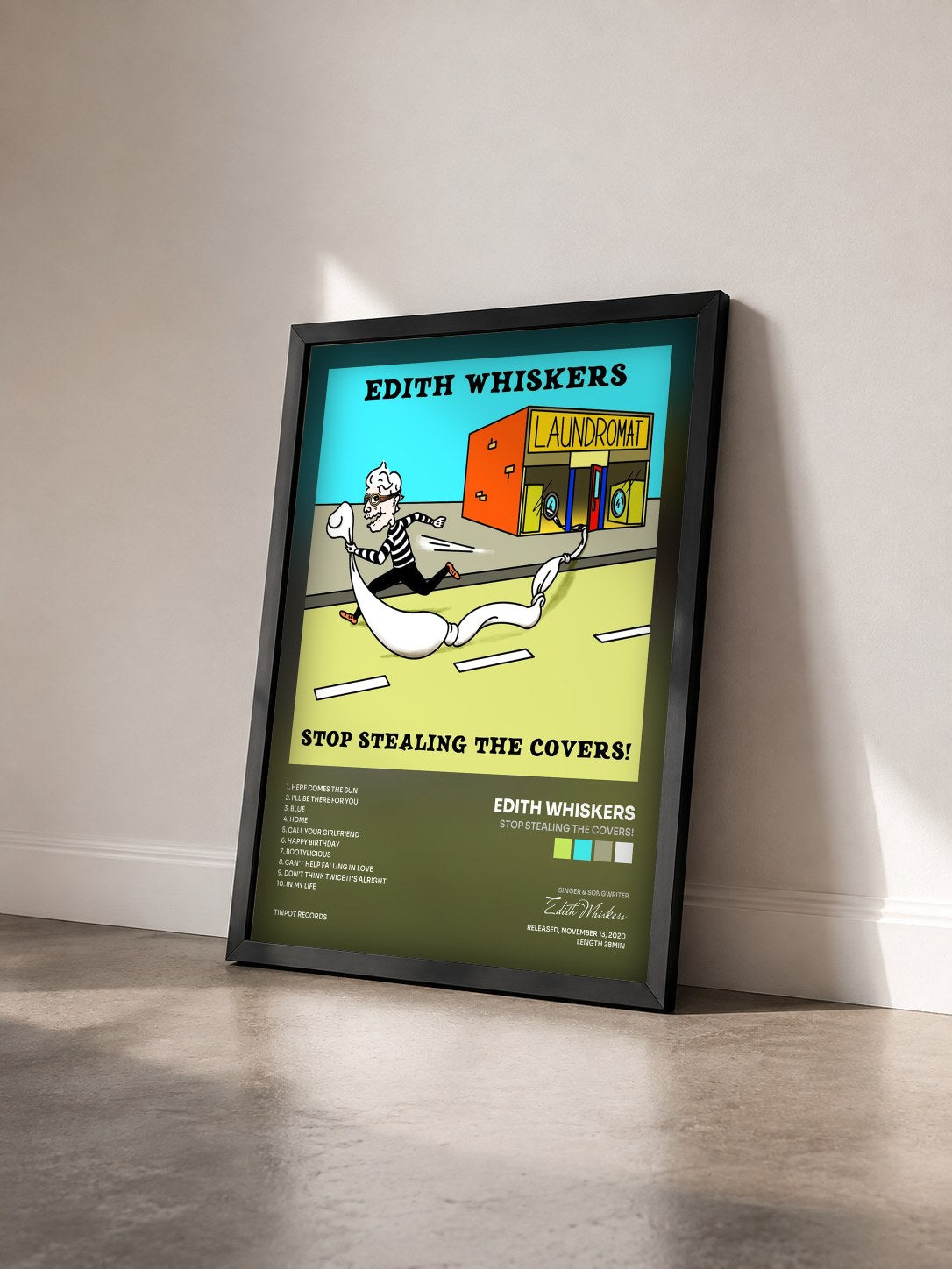 #noir Tableau de l'album Stop Stealing The Covers! de Edith Whiskers vu de trois quarts, cadre noir