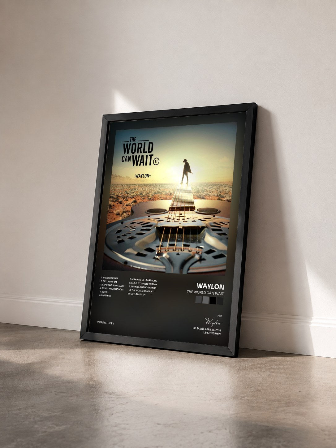 #noir Tableau de l'album The World Can Wait de Waylon vu de trois quarts, cadre noir