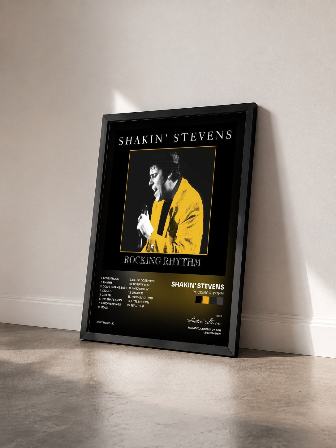 #noir Tableau de l'album Rocking Rhythm de Shakin' Stevens vu de trois quarts, cadre noir