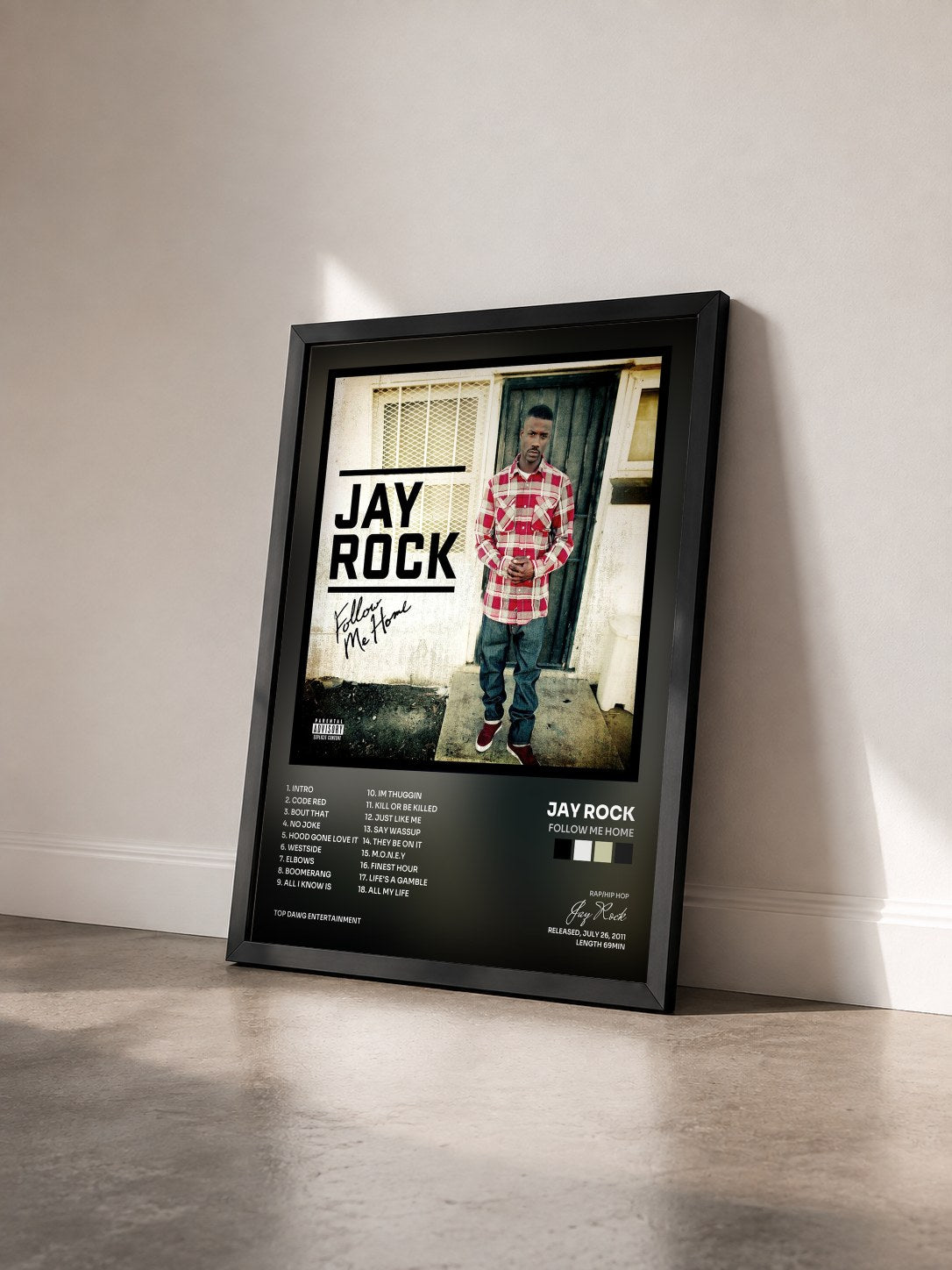 #noir Tableau de l'album Follow Me Home de Jay Rock vu de trois quarts, cadre noir
