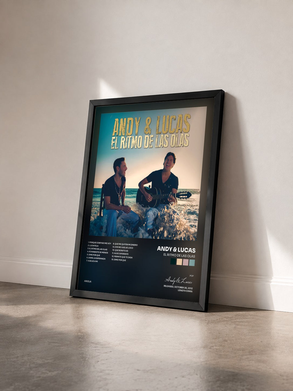#noir Tableau de l'album El Ritmo De Las Olas de Andy & Lucas vu de trois quarts, cadre noir