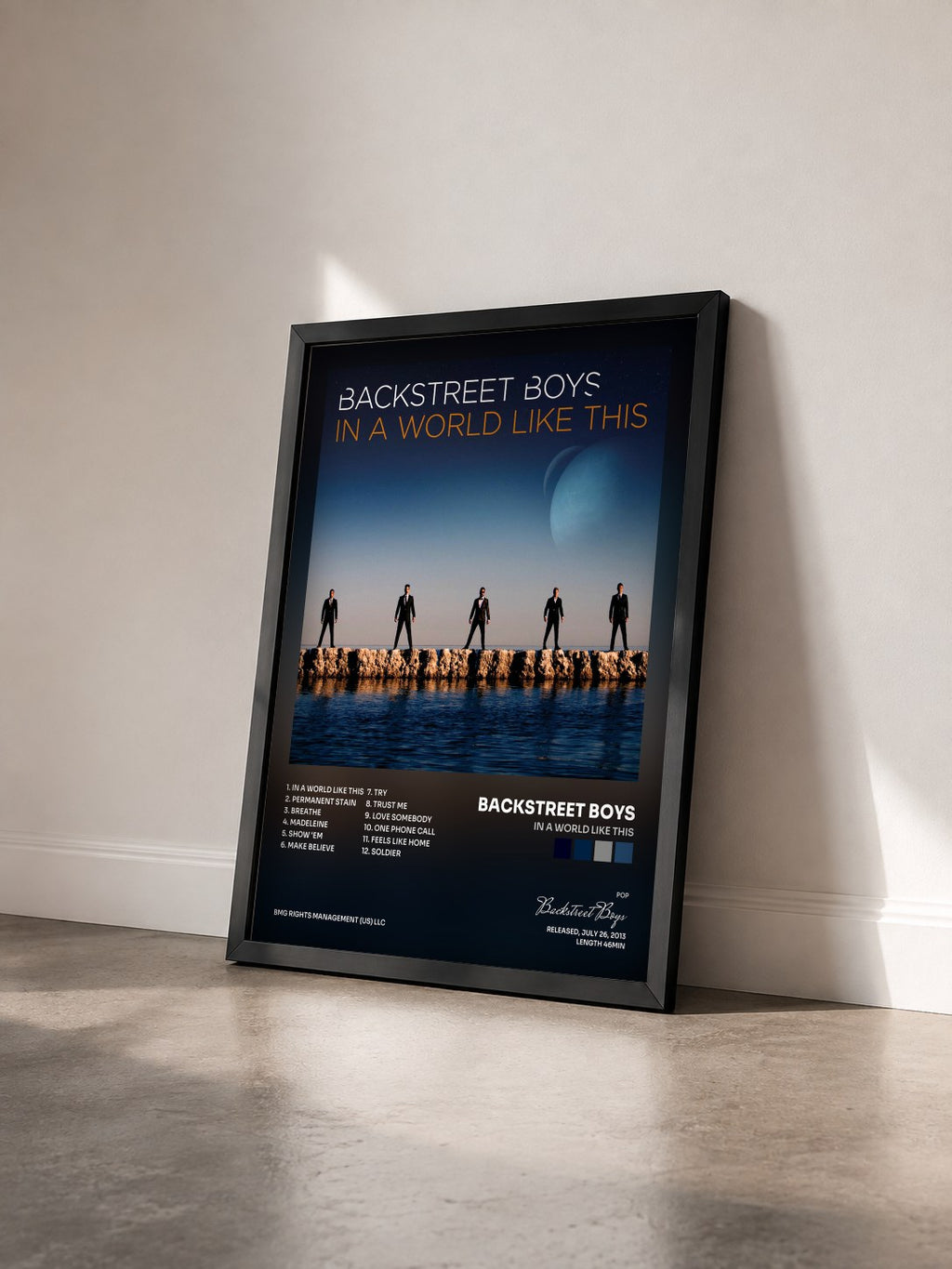 #noir Tableau de l'album In a World Like This de Backstreet Boys vu de trois quarts, cadre noir