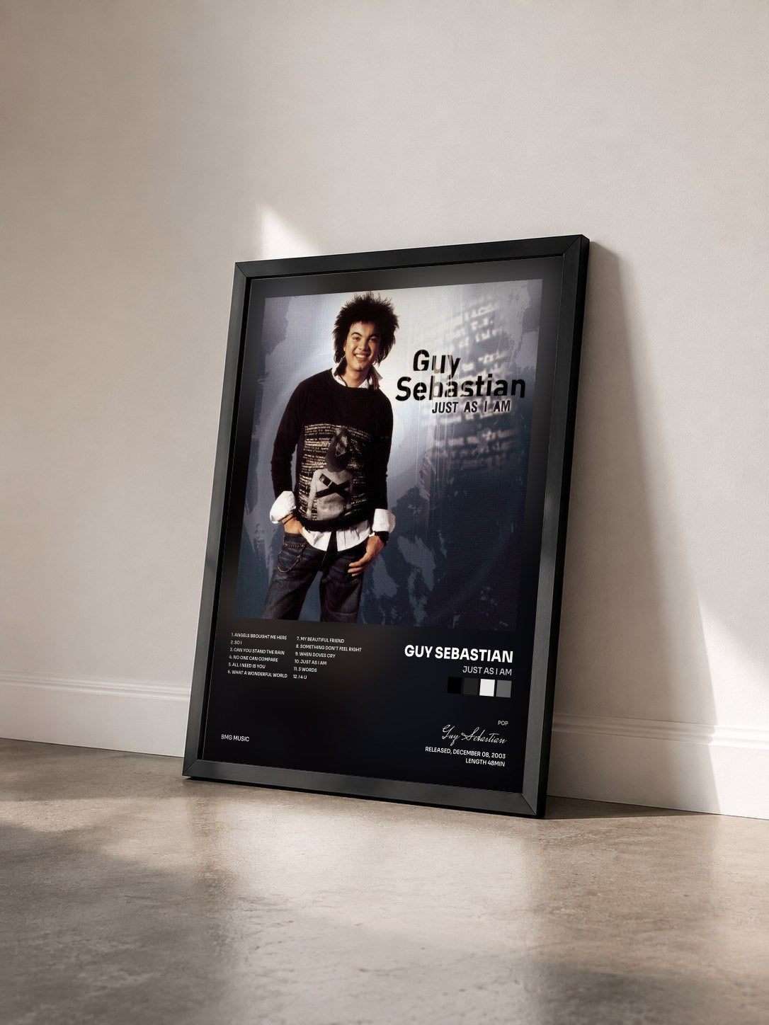 #noir Tableau de l'album Just As I Am de Guy Sebastian vu de trois quarts, cadre noir