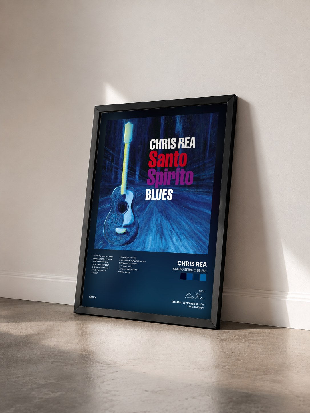 #noir Tableau de l'album Santo Spirito Blues de Chris Rea vu de trois quarts, cadre noir
