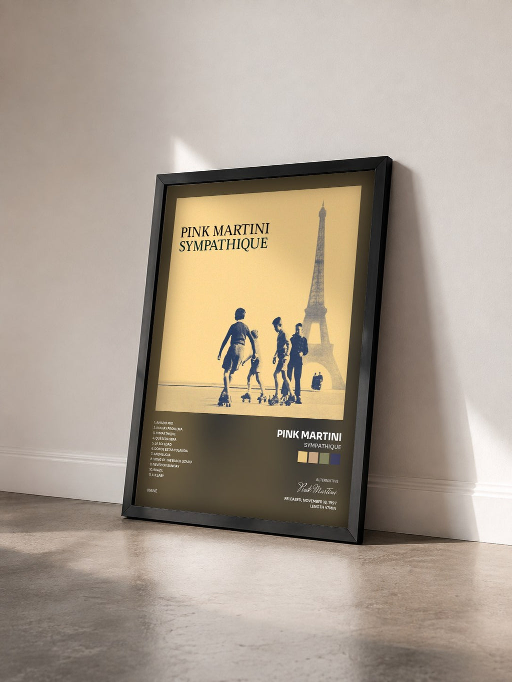 #noir Tableau de l'album Sympathique de Pink Martini vu de trois quarts, cadre noir