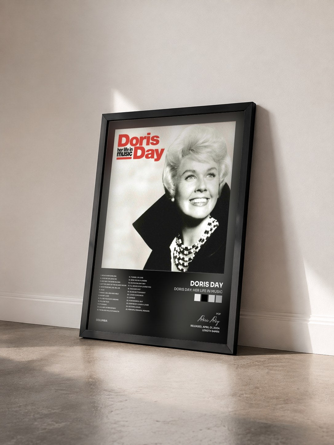 #noir Tableau de l'album Doris Day: Her Life In Music de Doris Day vu de trois quarts, cadre noir