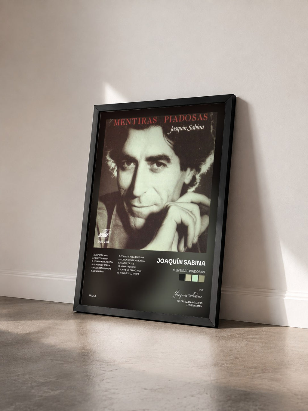 #noir Tableau de l'album Mentiras Piadosas de Joaquín Sabina vu de trois quarts, cadre noir