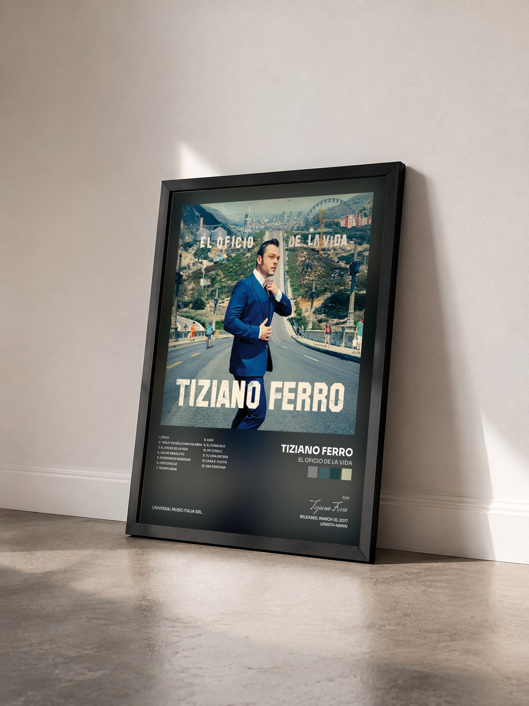 #noir Tableau de l'album El Oficio De La Vida de Tiziano Ferro vu de trois quarts, cadre noir