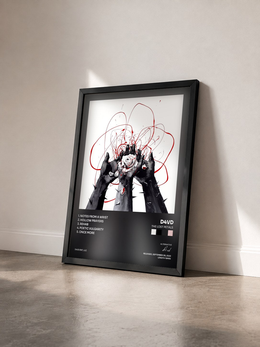 #noir Tableau de l'album The Lost Petals de d4vd vu de trois quarts, cadre noir
