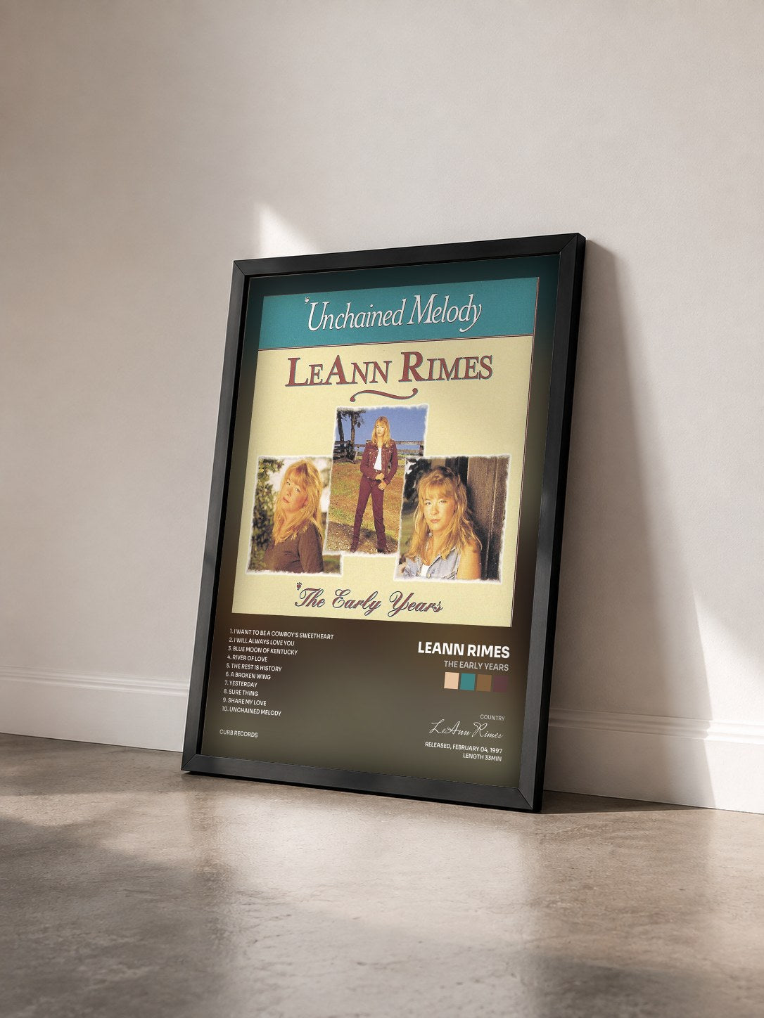 #noir Tableau de l'album The Early Years de LeAnn Rimes vu de trois quarts, cadre noir