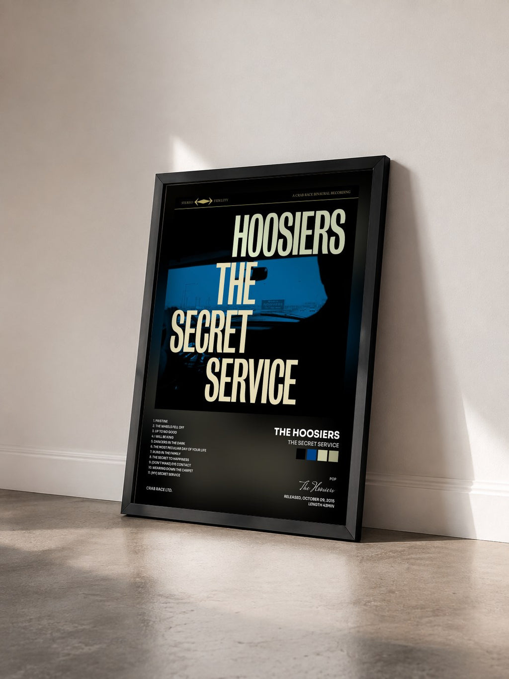 #noir Tableau de l'album The Secret Service de The Hoosiers vu de trois quarts, cadre noir