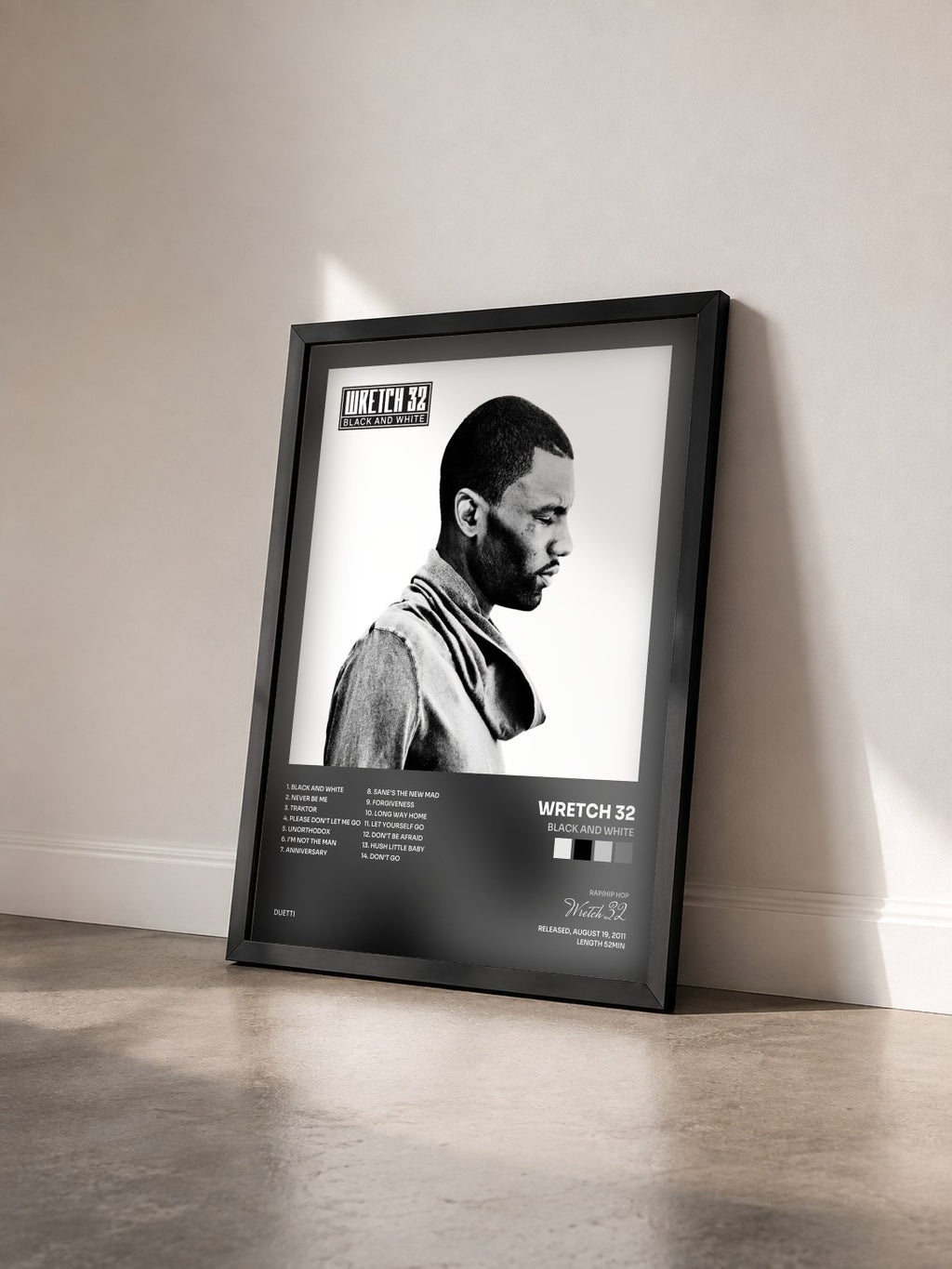 #noir Tableau de l'album Black and White de Wretch 32 vu de trois quarts, cadre noir