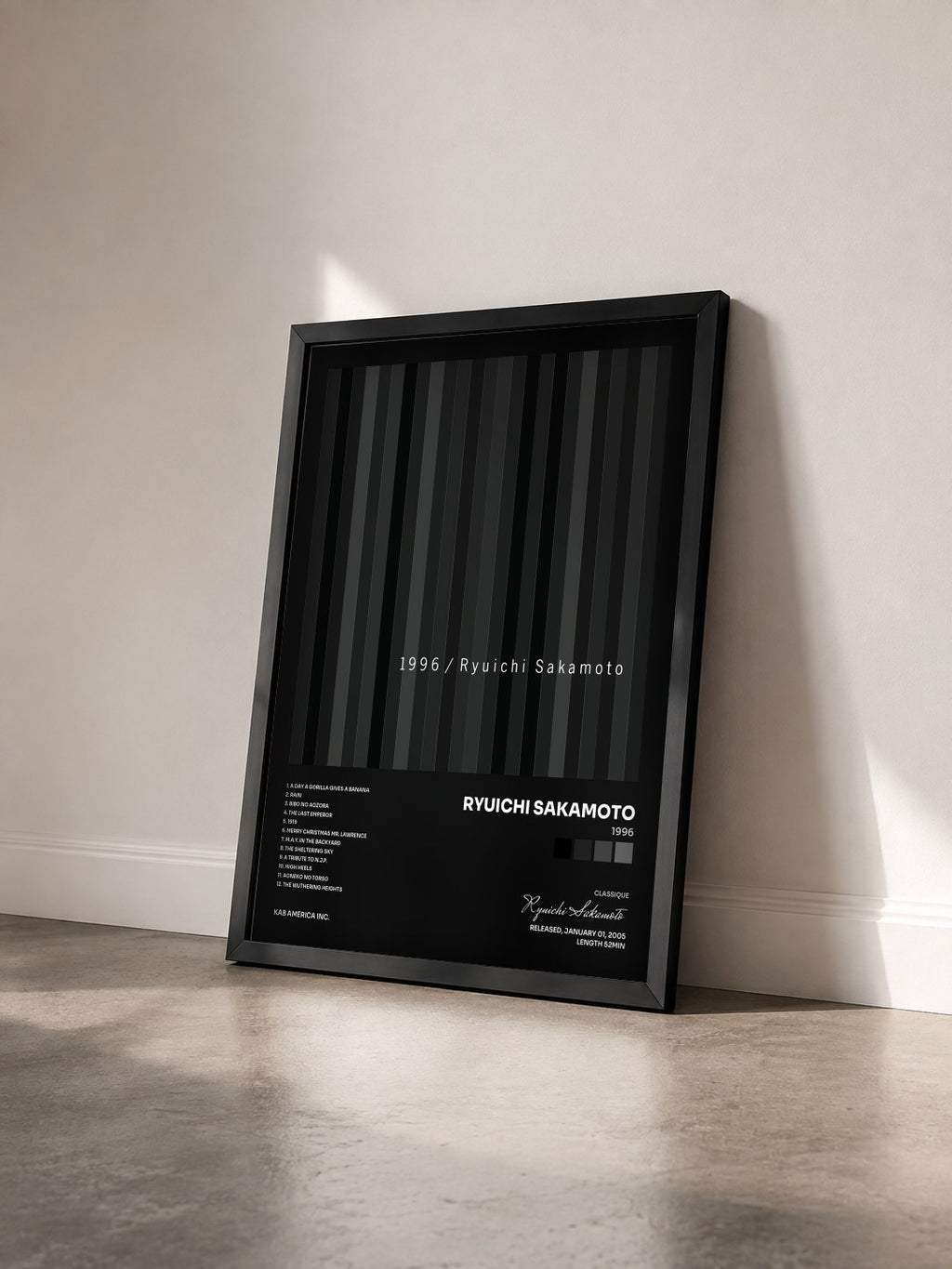 #noir Tableau de l'album 1996 de Ryuichi Sakamoto vu de trois quarts, cadre noir